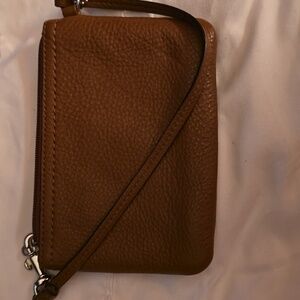 Coach small brown wristlet.